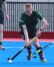 Murdo playing hockey